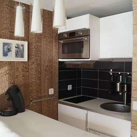 Aux Pieds Les 3 Vallees Apartment